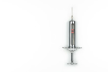 Top View Of A Big Stainless Steel Syringe On White Background