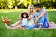 © NDABCREATIVITY - Picture of lovely couple with their daughter having picnic