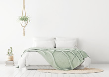 Home Bedroom Interior Mockup With Bed, Green Plaid, Pillows, Rug And Plants On Empty White Wall Background. 3D Rendering.