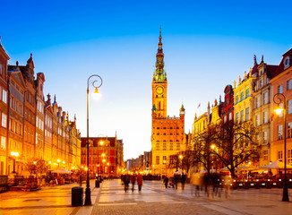 Wall Mural - Long street at Old town of Gdansk lluminated at night, Poland, retro toned