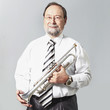 © yurolaitsalbert - portrait.experienced teacher of music with a trumpet