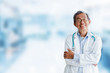 © Nattakorn - Portrait senior asian doctor over radiography background, asian medical concept