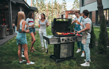 Group of friends on barbeque party