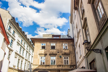 old european narrow street building facade