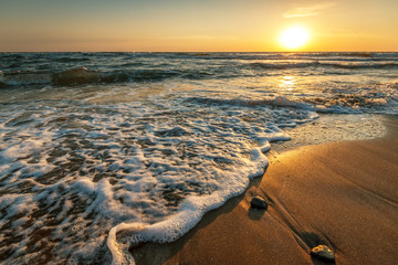 Wall Mural - Beautiful sunrise over the sea.