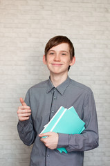 Wall Mural - Portrait of the young Russian man at a brick wall