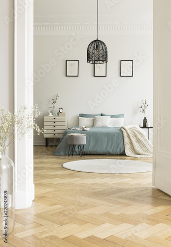 A Spacious Bedroom Interior In Pastel Colors With A Double