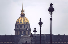 Historic Building With Golden Cupola In Paris