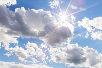 Blue sky with clouds and sun light