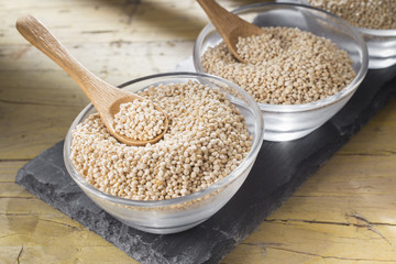 Wall Mural - quinoa beans in bowl on rustic wood