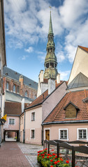 Medieval buildings and church in old town of Riga. Here tourists can find Gothic ensembles and rare ancient buildings, all this create and unforgettable atmosphere of the Middle Ages, Latvia,EC
