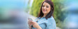 © thodonal - Pretty young woman using her mobile phone