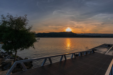 Amazing sunset from the dock of  the reservoir of Castrelo de Miño in Ourense, Galicia (Spain).