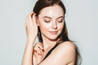 © Utkamandarinka - Beautiful brunette womanwith healthy hair and natural makeup