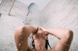 © hedgehog94 - Beautiful woman taking shower in her bathroom.