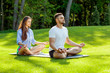 © Rock and Wasp - girl in park doing yoga with their teacher