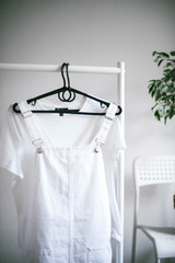 Interior Design. white clothes hanging on a hanger