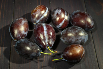 Sticker - Plums on a dark table