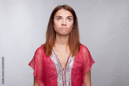 Thoughtful Mixed Raced Female With Ginger Straight Hair Has