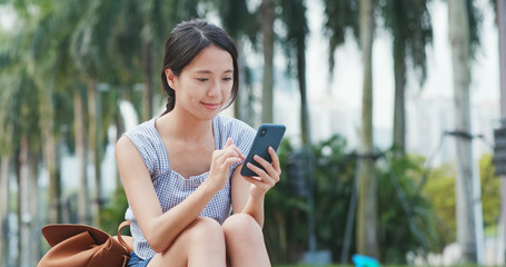 Poster - Woman sending sms on cellphone