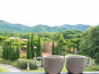 couple cup of coffee with mountains landscape.  Beauty nature background, copy space, relax time