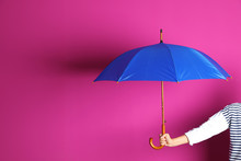 Woman Holding Beautiful Umbrella On Color Background With Space For Design