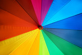 Fototapeta Tęcza - Color umbrella as background, closeup view