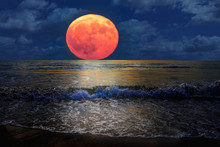 Beautiful Landscape Of Full Moon Rising In The Beach