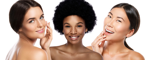Wall Mural - different ethnicity women - caucasian, african, asian on white background