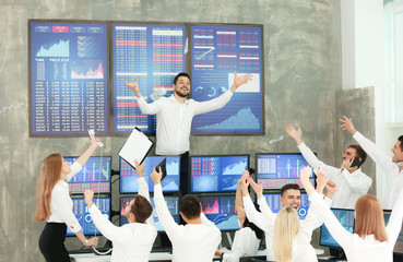 Poster - Excited stock traders celebrating success in office