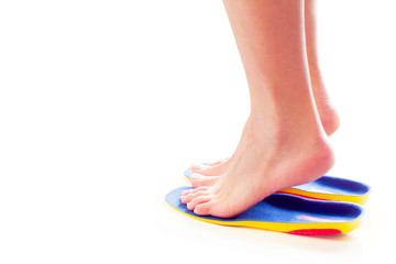 Wall Mural - orthopedic insoles and female feet