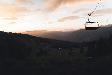 Wall Mural - Landscape view of a chair lift in Vail, Colorado during sunset. 