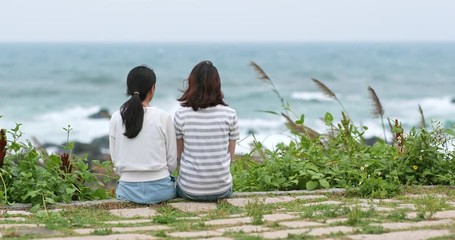 Poster - Friends talking to each other and sitting at the seaside