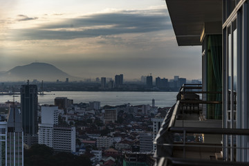 Condominium view on Penang city and shore under an early mornin sunrise, Malaysia