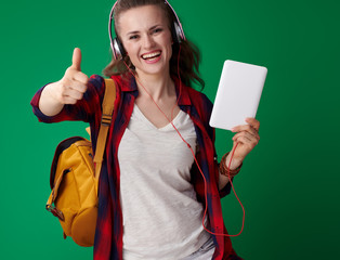 Wall Mural - happy modern student woman with tablet PC showing thumbs up