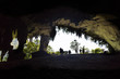 Silhouette of people at Great Cave chamber, Mulu National Park