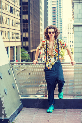 Young Man With Brown Curly Hair Wearing Sunglasses Patterned