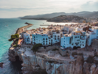 rock, roof and white houses of the Spanish city of Peniscola. province of Castellon, Valencian Community, Spain.