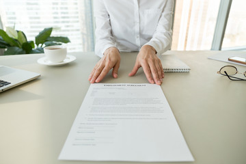 Female hr or employer offering employment agreement document for reading labor contract terms and work conditions, hiring new employee process and getting job, recruitment concept, close up view