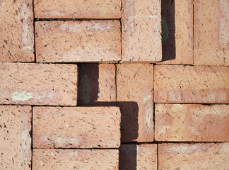 Wall Mural - Brick stack background. Red clay bricks. Flat lay.