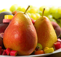 Wall Mural - different fruits and sweets on wooden table