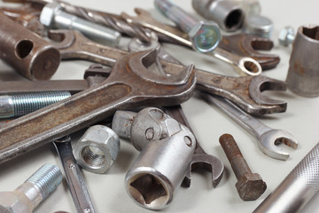 New and rusty metal tool and parts for repairing machinery close up