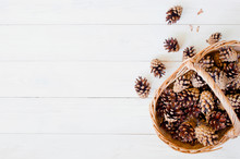 Background With Pine Cones In The Basket