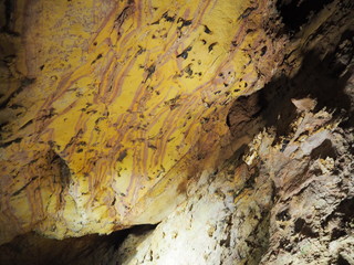 Wall Mural - View on the inside of a very old stone cave