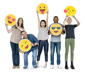 Wall Mural - Diverse happy people holding happy emoticons