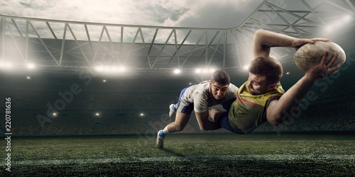 Fototapety Rugby  dwoch-mezczyzn-rugby-walczy-o-pilke-w-locie-na-profesjonalnym-stadionie-rugby