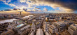 London, England - Aerial panoramic skyline view of London taken from top of St.Paul's Cathedral with dramatic clouds at sunset