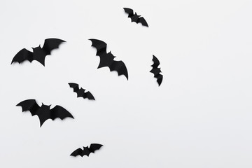 Wall Mural - halloween and decoration concept - paper bats flying