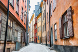 Fototapeta Uliczki - Beautiful street with colorful buildings of Old Town in Stockholm, Sweden