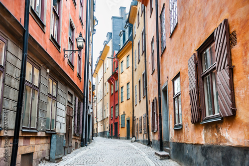 Beautiful street with colorful buildings of Old Town in Stockholm, Sweden Wallpaper Mural